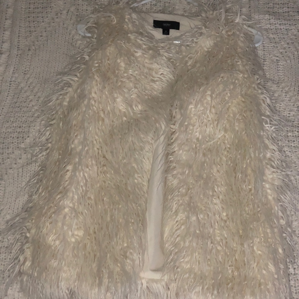 White faux fur vest